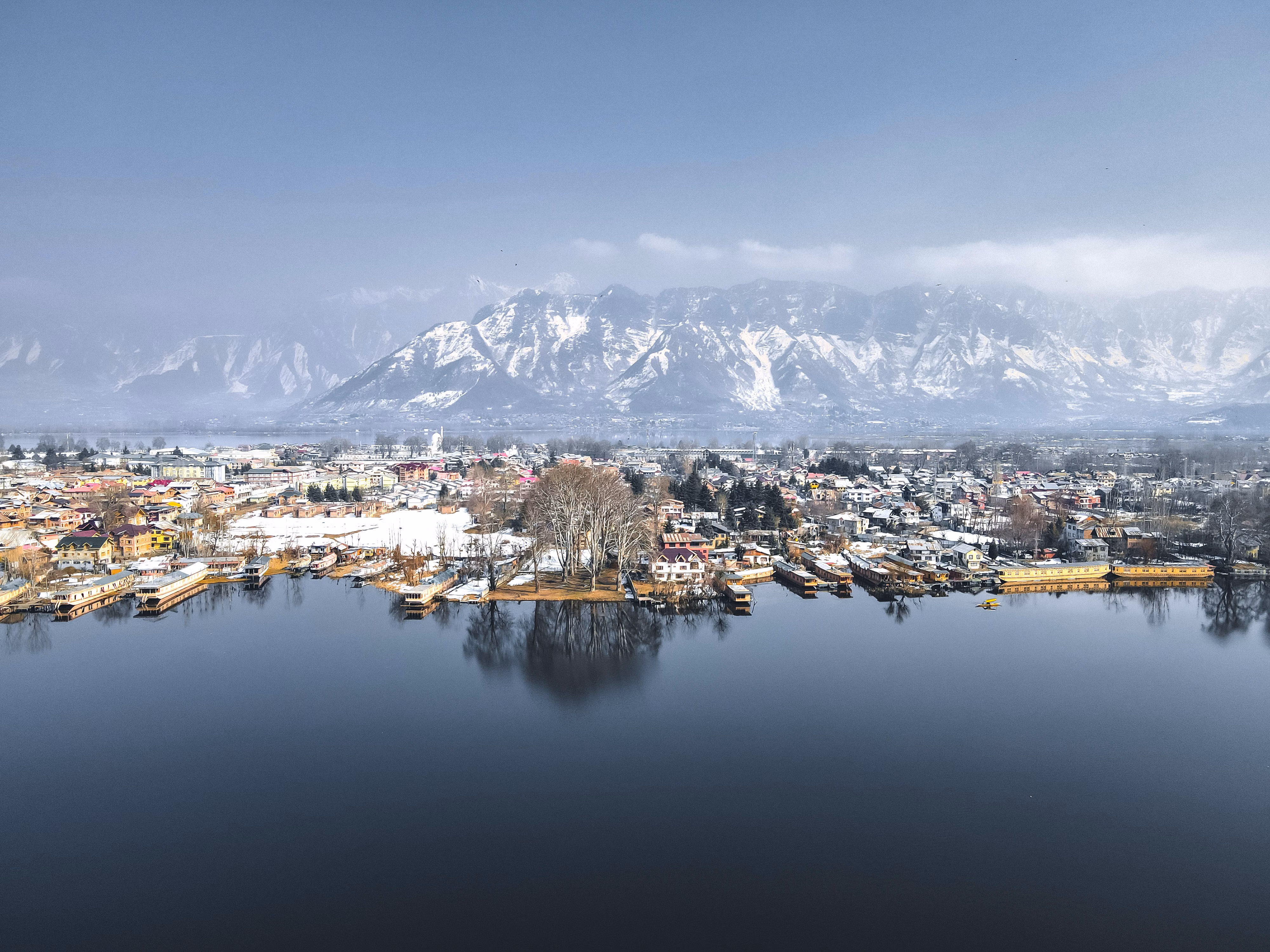 Kashmir - Discover paradise on earth with stunning Dal Lake, snow-capped mountains, luxury houseboats, and authentic Kashmiri hospitality.